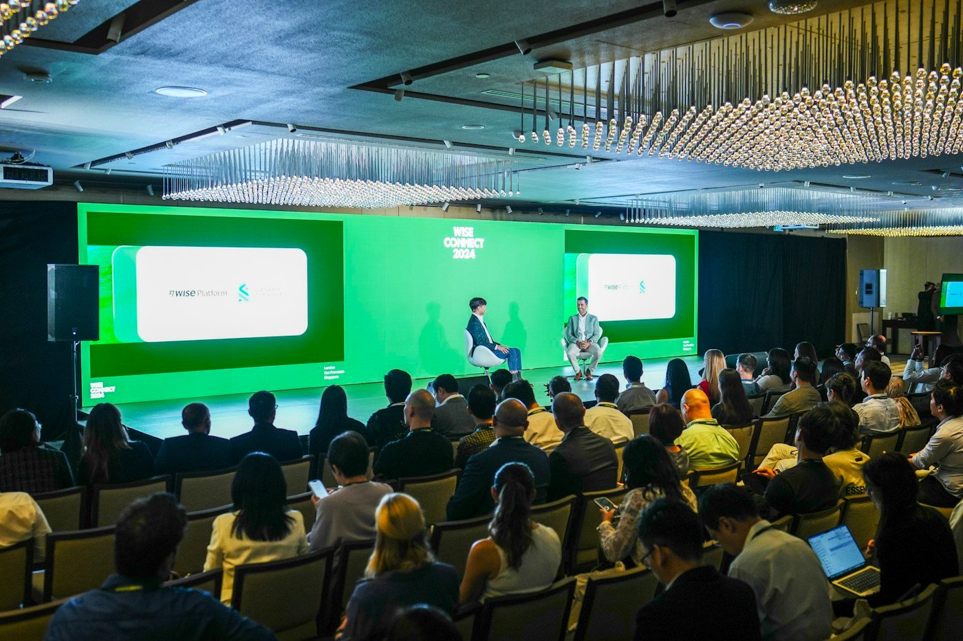 Audience attending a professional panel discussion