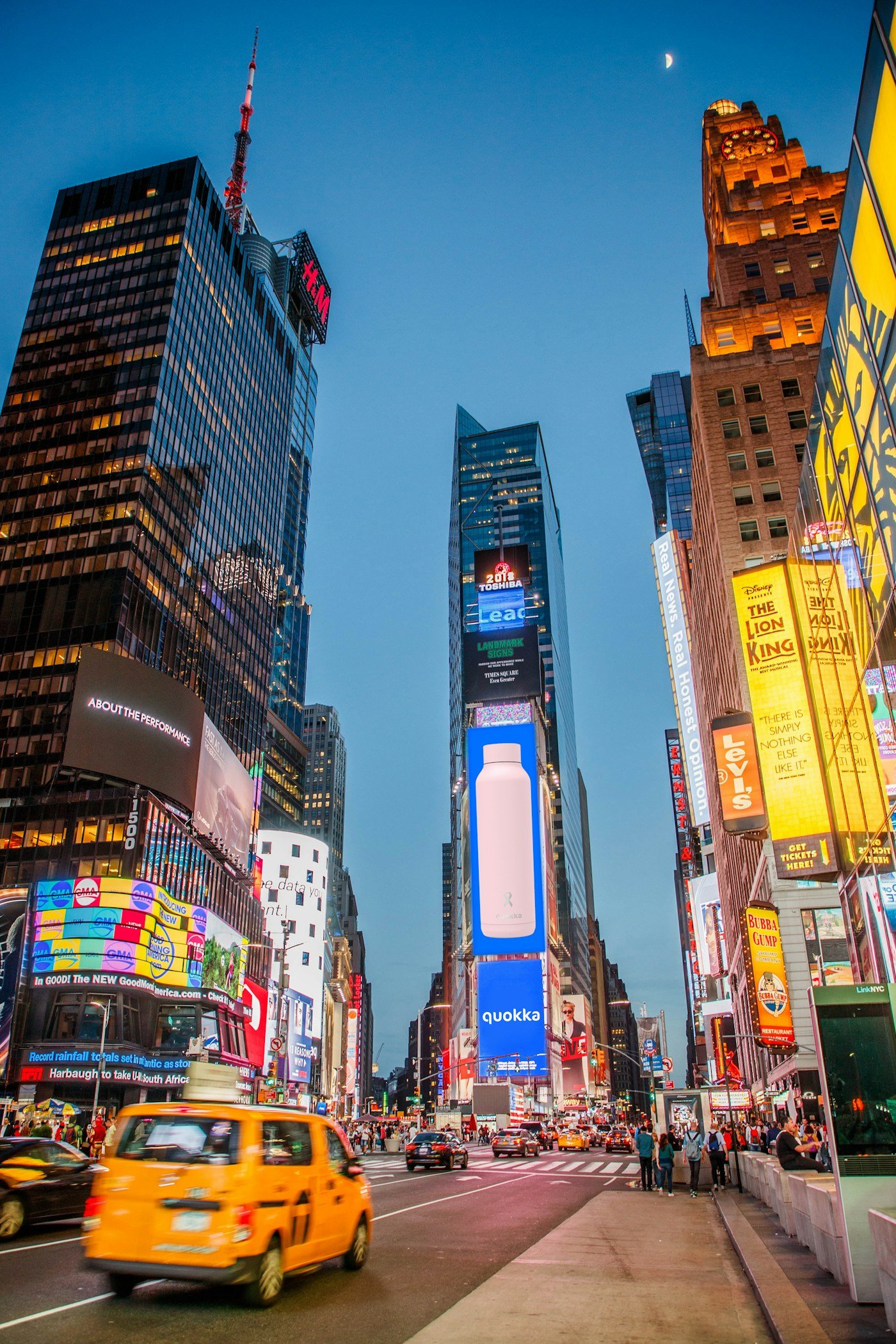Tall buildings and colourful digital billboards in Times Square